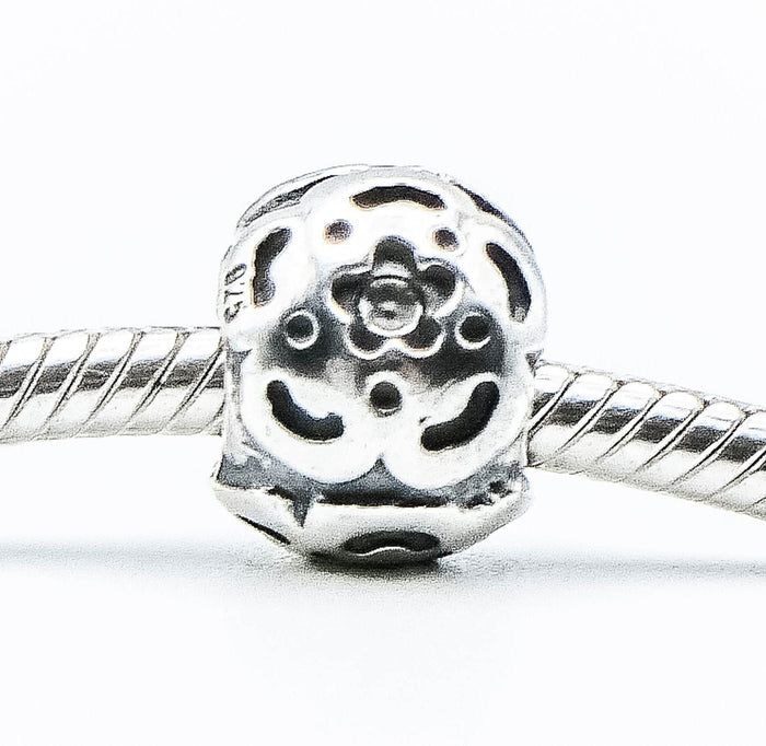 PANDORA Raised Flower Sterling Silver Charm With Salmon Zirconia