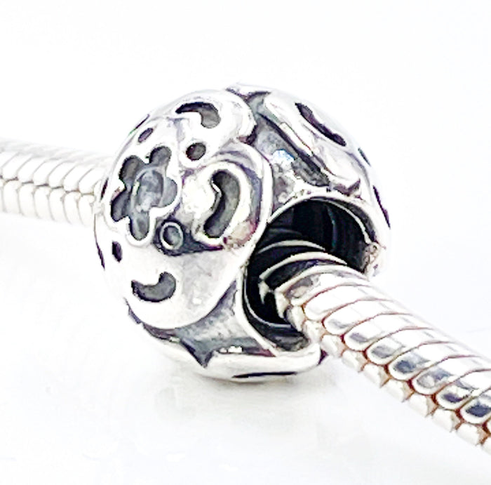 PANDORA Raised Flower Sterling Silver Charm With Salmon Zirconia
