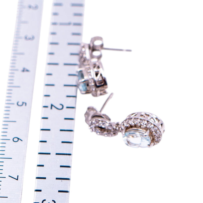Sterling Silver 5/8 Inch Blue Topaz & Diamond Halo Drop Earrings